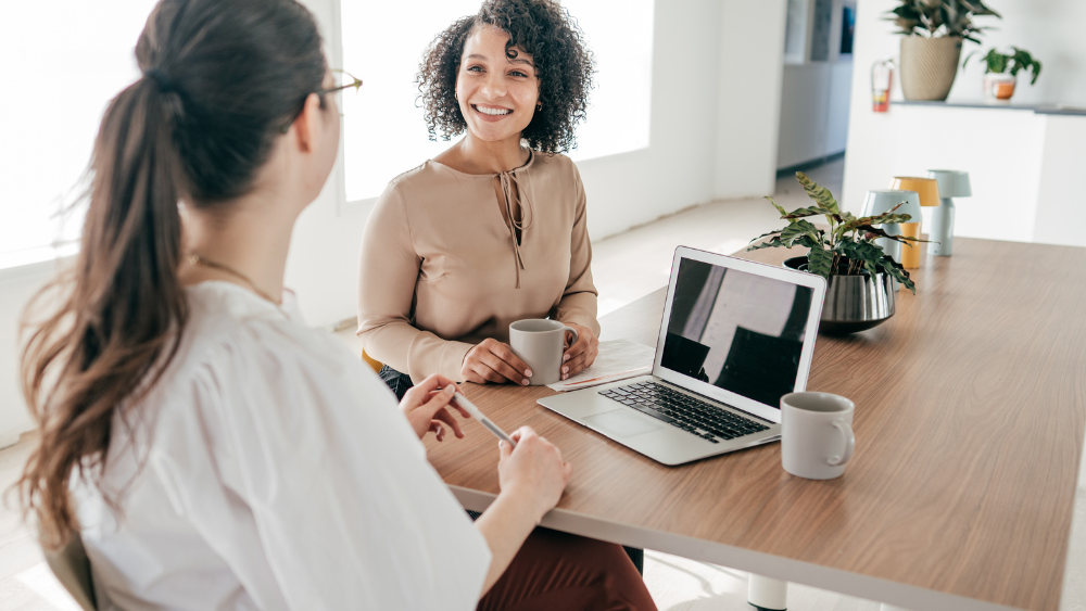 Two women using Copilot for Microsoft 365.